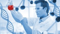 Scientist examining a beaker in a laboratory