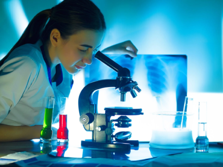 student-girl-looking-microscope-science-laboratory-concept-1-scaled