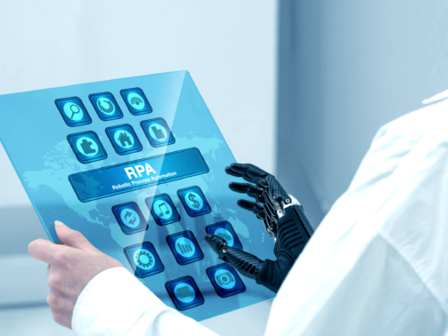 Business user using a low-code platform to create RPA automation with cognitive AI integration in 2025